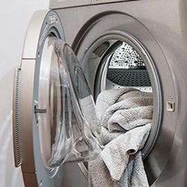 Les pièces de linge n'ont pas été placées correctement dans le tambour